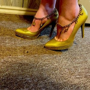 New without box.  Beautiful gold& glitter baby phat heels